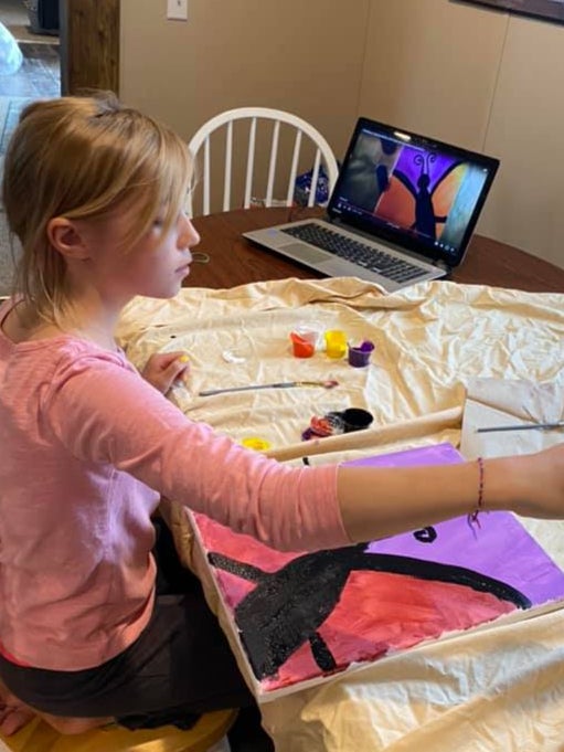 uncorked inspiration guest doing a virtual paint and sip while watching our video tutorial